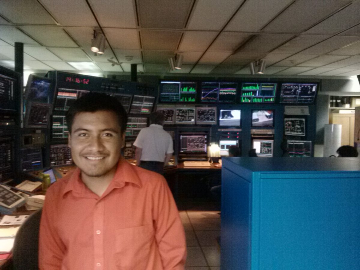 Noel Alberto Cruz Venegas in a control room with monitors